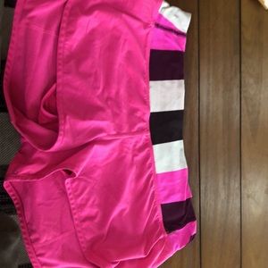 Lululemon Speedy.pink with black/pink top.  Zipper in back plus liner